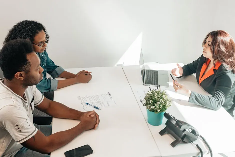 professional meeting between a lawyer and a client in a modern office setting - japanese immigration lawyers professional meeting between a lawyer and a client in a modern office setting - japanese immigration lawyers